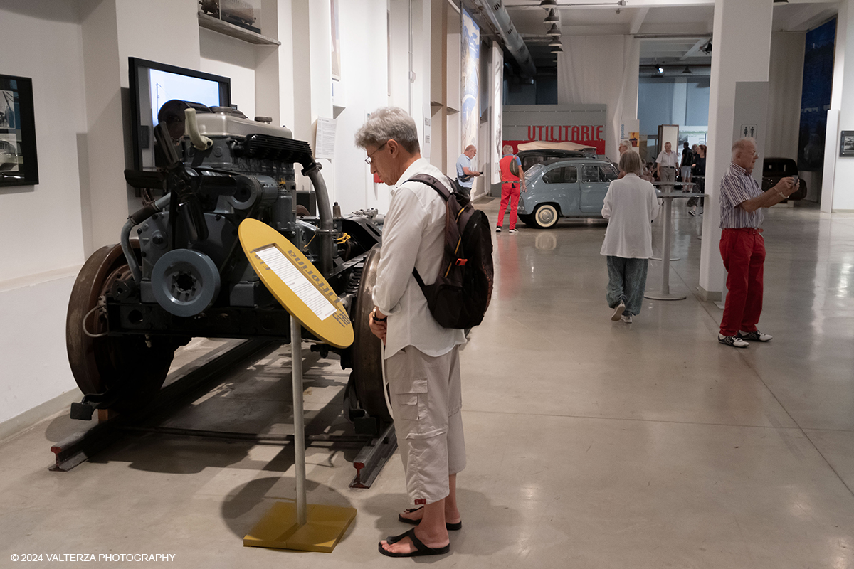 _DSF4139.jpg - 12/07/2024.Torino. Inaugurato nel 1963, il Centro Storico Fiat ha sede in un edificio liberty che fu il primo ampliamento (1907) delle officine di corso Dante dove nacque l'azienda. Ora il Centro Storico ospita una collezione di automobili, cimeli, modellini e manifesti pubblicitari che copre l'intera storia dell'azienda. In concomitanza con le storiche celebrazioni di FIAT, il Centro Storico FIAT eâ€™ aperto al pubblico Venerdi 12, Sabato 13, Domenica 14 per rendere omaggio alla leggendaria Mefistofele, realizzata nel 1923 dallâ€™inglese Ernest Eldridge, e al suo record di velocitÃ  di 234.98 km/h conquistato 100 anni fa. Nella foto in visita al centro storico