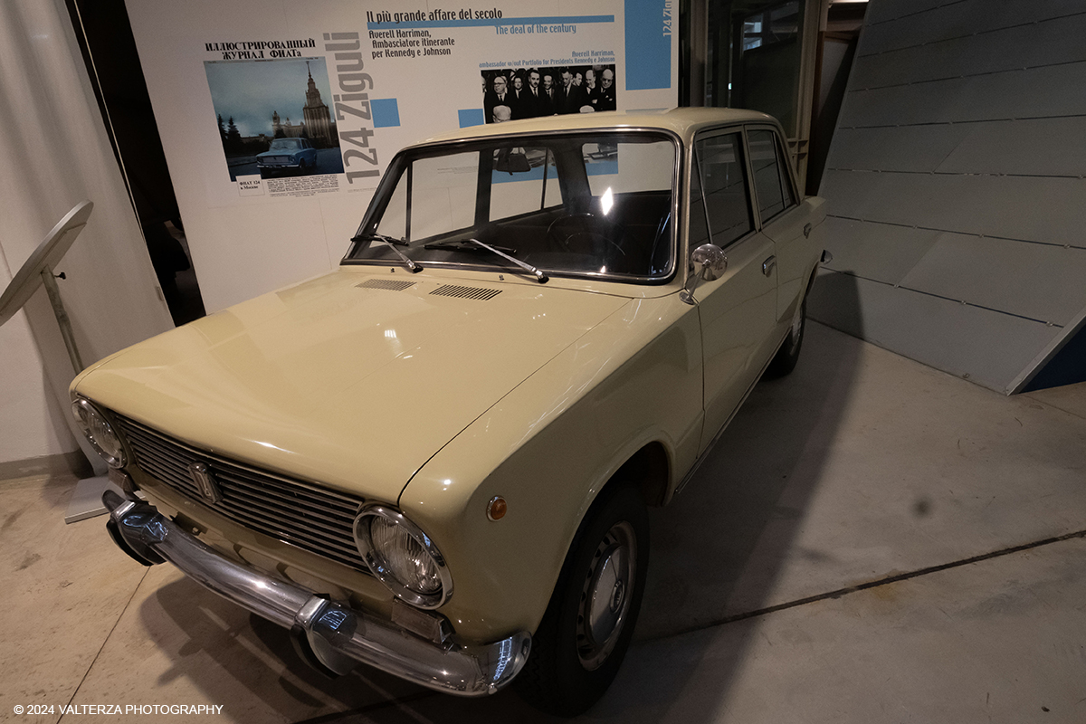 _DSF4141.jpg - 12/07/2024.Torino. Inaugurato nel 1963, il Centro Storico Fiat ha sede in un edificio liberty che fu il primo ampliamento (1907) delle officine di corso Dante dove nacque l'azienda. Ora il Centro Storico ospita una collezione di automobili, cimeli, modellini e manifesti pubblicitari che copre l'intera storia dell'azienda. In concomitanza con le storiche celebrazioni di FIAT, il Centro Storico FIAT eâ€™ aperto al pubblico Venerdi 12, Sabato 13, Domenica 14 per rendere omaggio alla leggendaria Mefistofele, realizzata nel 1923 dallâ€™inglese Ernest Eldridge, e al suo record di velocitÃ  di 234.98 km/h conquistato 100 anni fa. Nella foto FIAT 124 ZigulÃ¬ 1966