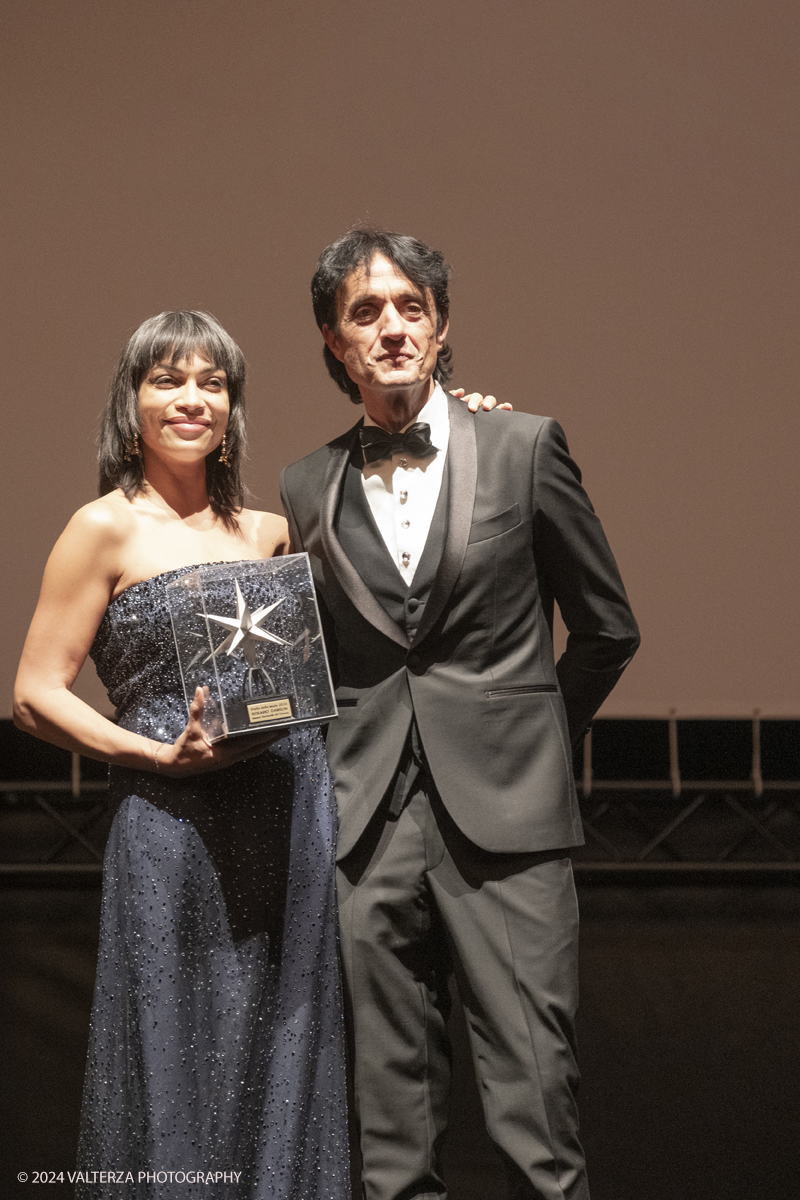 _DSF4472.jpg - TURIN, ITALY - NOVEMBER 22:  Rosario Dawson , with Giulio Bove, attend the 42nd Torino Film Festival 2024 Opening Ceremony and receives the Stella della Mole award