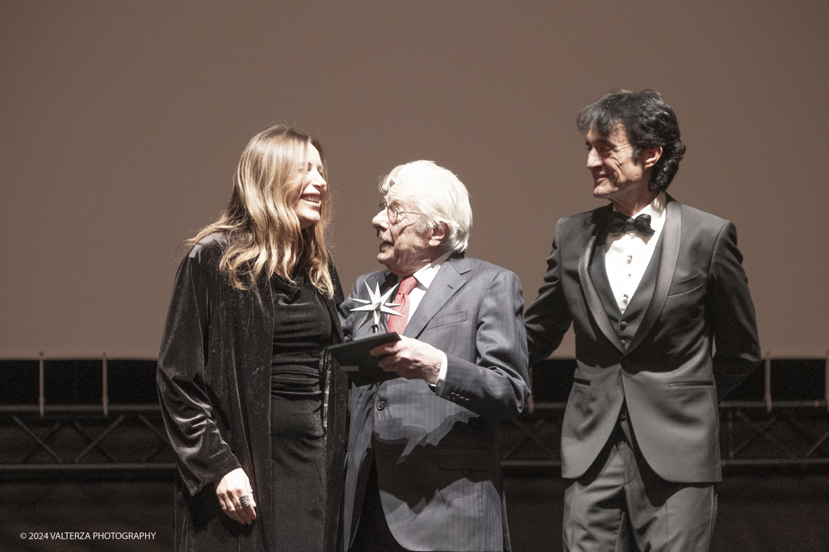 _DSF4561.jpg - TURIN, ITALY - NOVEMBER 22: Giancarlo Giannini , with Lucia Borgonzoni and Giulio Bove, attend the 42nd Torino Film Festival 2024 Opening Ceremony and receives the Stella della Mole award