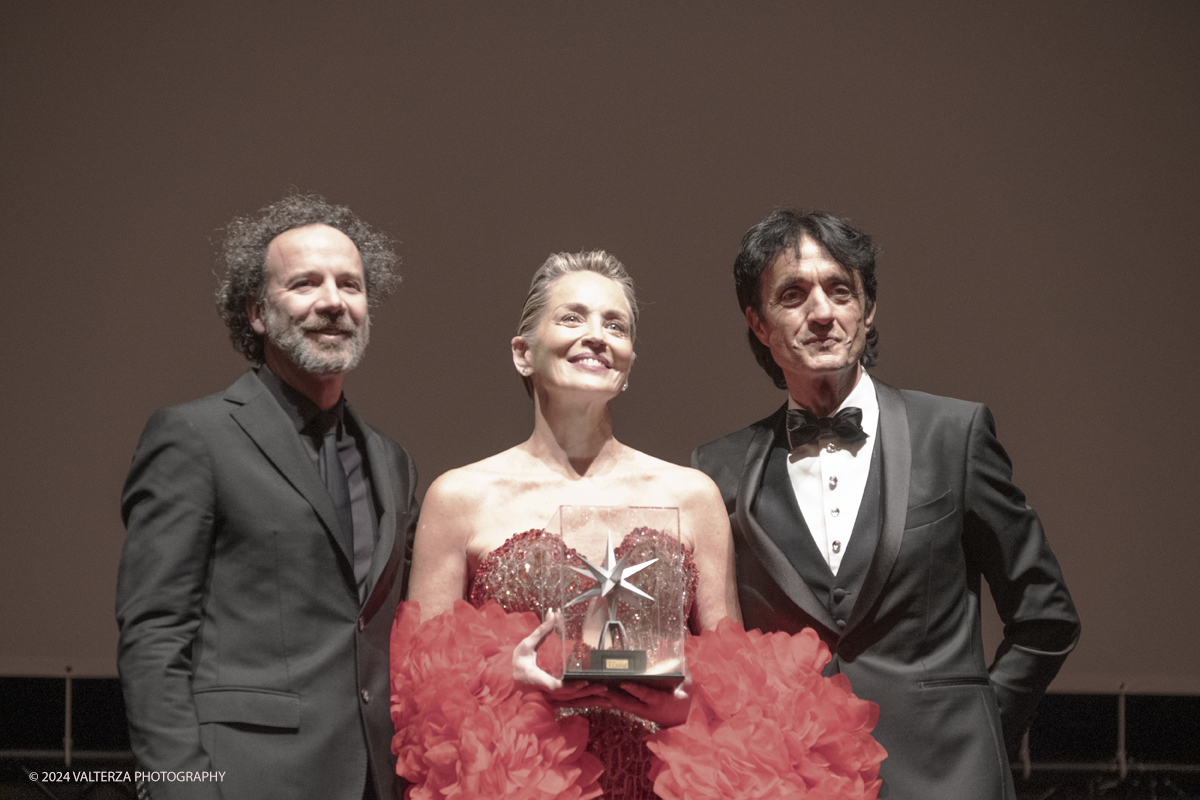 _DSF4856.jpg - TURIN, ITALY - NOVEMBER 22: Sharon Stone attend the 42nd Torino Film Festival 2024 Opening Ceremony, with Carlo Chatrian and Giulio Bove,  and receives the Stella della Mole award