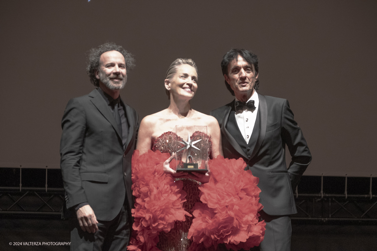 _DSF4858.jpg - TURIN, ITALY - NOVEMBER 22: Sharon Stone attend the 42nd Torino Film Festival 2024 Opening Ceremony, with Carlo Chatrian and Giulio Bove,  and receives the Stella della Mole award