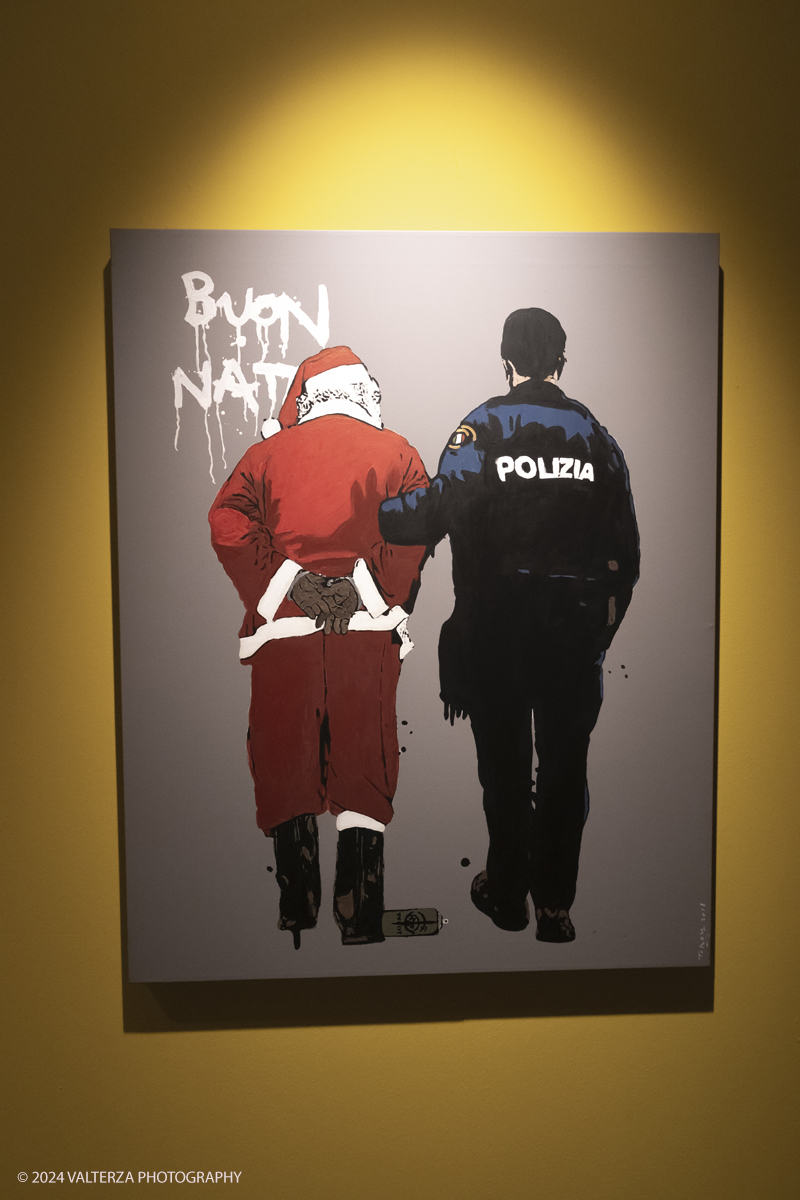 _DSF9722.jpg - Turin. 15/11/2024. The Promotrice delle Belle Arti in Turin hosts the exhibition â€œBanksy & Friends: stories of rebel artistsâ€� which highlights the most daring and provocative works of the contemporary art scene. Author TVBOY Santa Claus illegal immigrant, 2020