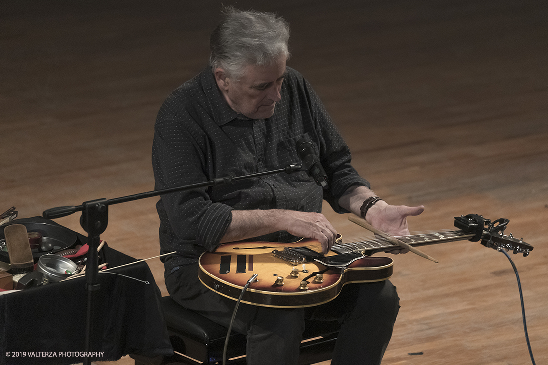 _G3I3052.jpg - 28/04/2019.Torino,.Attivo da oltre cinquantâ€™anni nei piuÌ€ disparati contesti musicali, Fred Frith eÌ€ un vero pioniere della chitarra elettrica, fin dai tempi di gruppi avant rock come Henry Cow o Massacre (con Bill Laswell). Come improvvisatore radicale ha suonato con figure del calibro di Robert Wyatt o John Zorn e come compositore ha visto suoi lavori interpretati da affermati ensemble di musica contemporanea. Nella foto Fred Frith nella esibizione "solo electric guitar" sul palco del conservatorio Giuseppe Verdi.