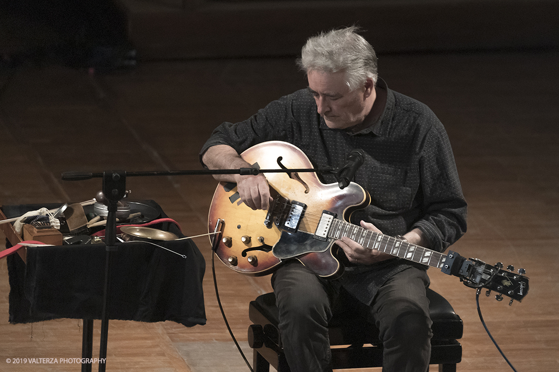 _G3I3097.jpg - 28/04/2019.Torino,.Attivo da oltre cinquantâ€™anni nei piuÌ€ disparati contesti musicali, Fred Frith eÌ€ un vero pioniere della chitarra elettrica, fin dai tempi di gruppi avant rock come Henry Cow o Massacre (con Bill Laswell). Come improvvisatore radicale ha suonato con figure del calibro di Robert Wyatt o John Zorn e come compositore ha visto suoi lavori interpretati da affermati ensemble di musica contemporanea. Nella foto Fred Frith nella esibizione "solo electric guitar" sul palco del conservatorio Giuseppe Verdi.