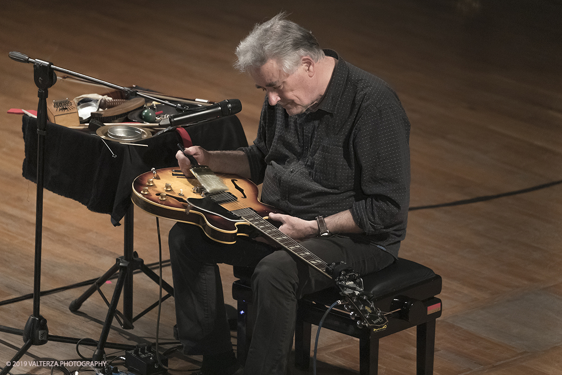 _G3I3176.jpg - 28/04/2019.Torino,.Attivo da oltre cinquantâ€™anni nei piuÌ€ disparati contesti musicali, Fred Frith eÌ€ un vero pioniere della chitarra elettrica, fin dai tempi di gruppi avant rock come Henry Cow o Massacre (con Bill Laswell). Come improvvisatore radicale ha suonato con figure del calibro di Robert Wyatt o John Zorn e come compositore ha visto suoi lavori interpretati da affermati ensemble di musica contemporanea. Nella foto Fred Frith nella esibizione "solo electric guitar" sul palco del conservatorio Giuseppe Verdi.