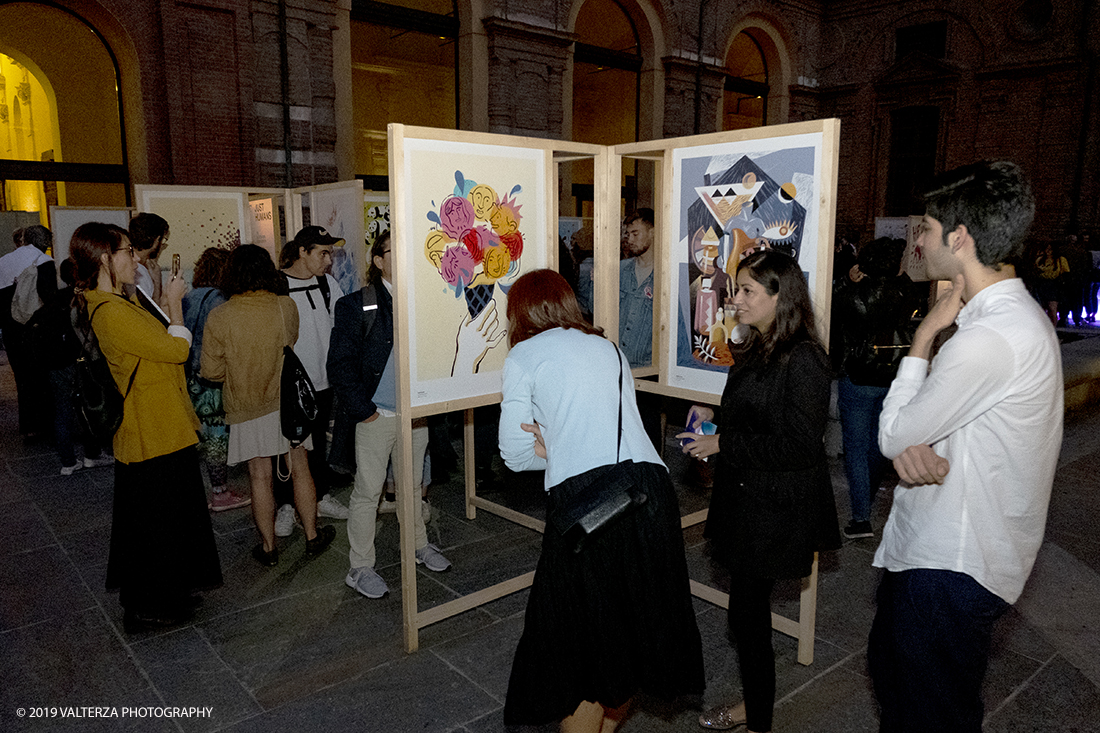 _DSF6139.jpg - 02/10/2019. Torino. Just Humans, 100 illustratori sono stati invitati a condividere la propria visione sul tema dellâ€™integrazione. 50 di loro arrivano dal panorama della scena locale ed hanno coinvolto altrettanti colleghi di provenienza nazionale ed internazionale a lavorare sul tema. Nella foto un momento della visita alla mostra.