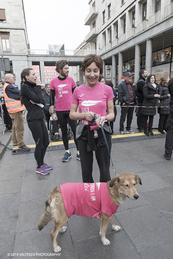 _G3I8240.jpg - 03-03-2019. Torino. â€œJust The Woman I am â€� Ã¨ una corsa/camminata podistica non competitiva di 6 km per sostenere la ricerca universitaria sul cancro: uomini e donne correranno fianco a fianco a sostegno della ricerca universitaria e della diffusione di una maggiore consapevolezza di sÃ© per un corretto stile di vita.  In questa giornata non c'Ã¨ solo la corsa, ma anche un fitto programma di eventi in piazza, non esclusivamente sportivi. Nella foto si corre anche assieme al proprio cane regolarmente iscritto