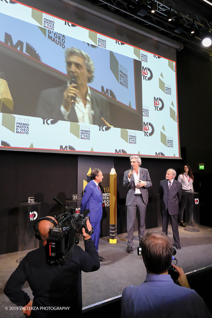 _DSF1294.jpg - 15/10/2019. Torino. Matita d'oro 2019. Anche quest'anno il Mauto ha assegnato i suoi prestigiosi premi al mondo dell'automobile. Nella foto  il Presidente del MAUTO Benedetto Camerana fÃ  il discorso inaugurale dell'evento.