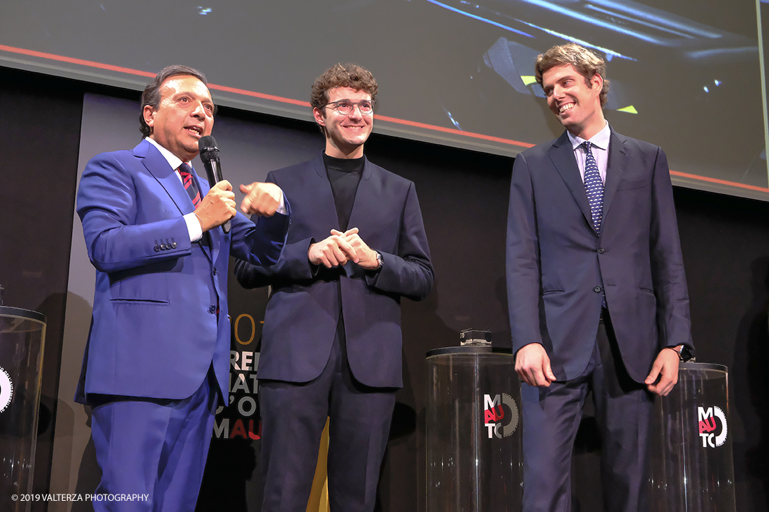 _DSF1444.jpg - 15/10/2019. Torino. Matita d'oro 2019. Anche quest'anno il Mauto ha assegnato i suoi prestigiosi premi al mondo dell'automobile. Nella foto Il  premio MAUTO "Avvocato Giovanni Agnelli 2019"  va a Sergio Pininfarina e Luca Campana giovani promesse del design per lâ€™innovativo progetto TUC.technology. un connettore modulabile che incrementa lâ€™intero sistema elettronico dei veicoli abilitandoli alla digitalizzazione e a unâ€™elevata personalizzazione.