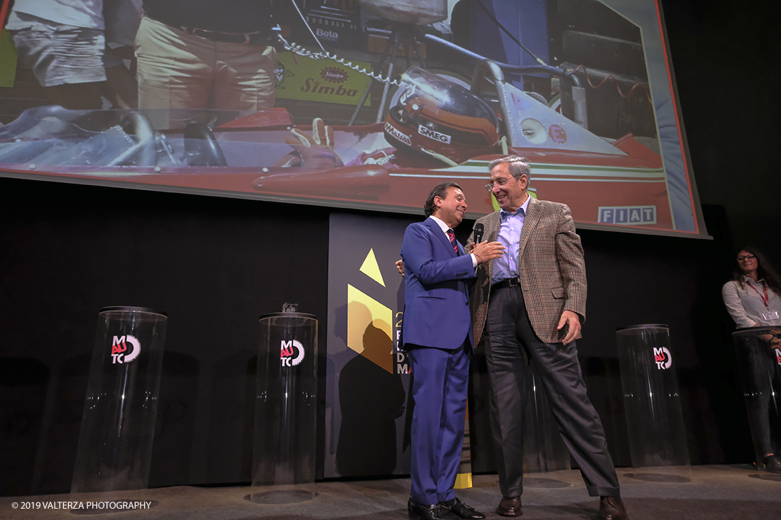 _DSF1512.jpg - 15/10/2019. Torino. Matita d'oro 2019. Anche quest'anno il Mauto ha assegnato i suoi prestigiosi premi al mondo dell'automobile. Nella foto Il premio MAUTO â€œCarlo Biscaretti di Ruffiaâ€� va allâ€™ Ing Mauro Forghieri  lâ€™insuperabile creativitÃ  ingegneristica e gli straordinari successi ottenuti su strada e su pista: durante gli anni in cui Ã¨ stato Direttore Tecnico della Scuderia Ferrari