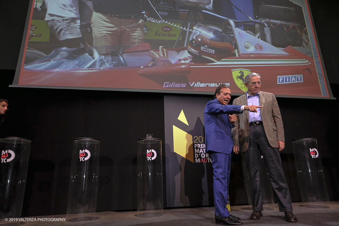 _DSF1517.jpg - 15/10/2019. Torino. Matita d'oro 2019. Anche quest'anno il Mauto ha assegnato i suoi prestigiosi premi al mondo dell'automobile. Nella foto Il premio MAUTO â€œCarlo Biscaretti di Ruffiaâ€� va allâ€™ Ing Mauro Forghieri  lâ€™insuperabile creativitÃ  ingegneristica e gli straordinari successi ottenuti su strada e su pista: durante gli anni in cui Ã¨ stato Direttore Tecnico della Scuderia Ferrari