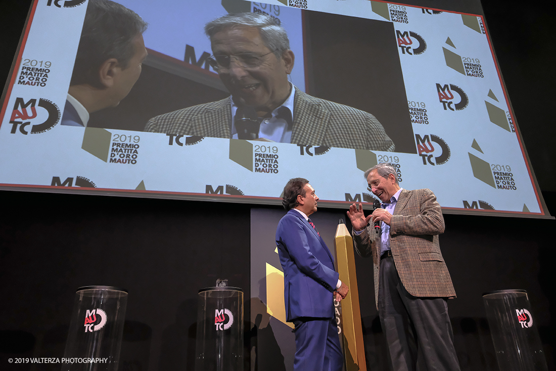 _DSF1533.jpg - 15/10/2019. Torino. Matita d'oro 2019. Anche quest'anno il Mauto ha assegnato i suoi prestigiosi premi al mondo dell'automobile. Nella foto Il premio MAUTO â€œCarlo Biscaretti di Ruffiaâ€� va allâ€™ Ing Mauro Forghieri  lâ€™insuperabile creativitÃ  ingegneristica e gli straordinari successi ottenuti su strada e su pista: durante gli anni in cui Ã¨ stato Direttore Tecnico della Scuderia Ferrari.