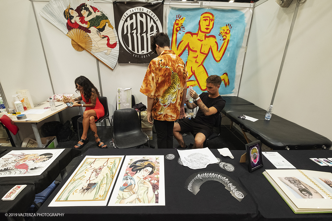 _DSF7851.jpg - 13/09/2019. Torino. Tattoo Convention Ã¨ un evento internazionale che ospita 340 tatuatori provenienti da tutto il mondo, 50 stand degli operatori e fornitori piÃ¹ importanti del settore. Nella foto stand di un tatuatore