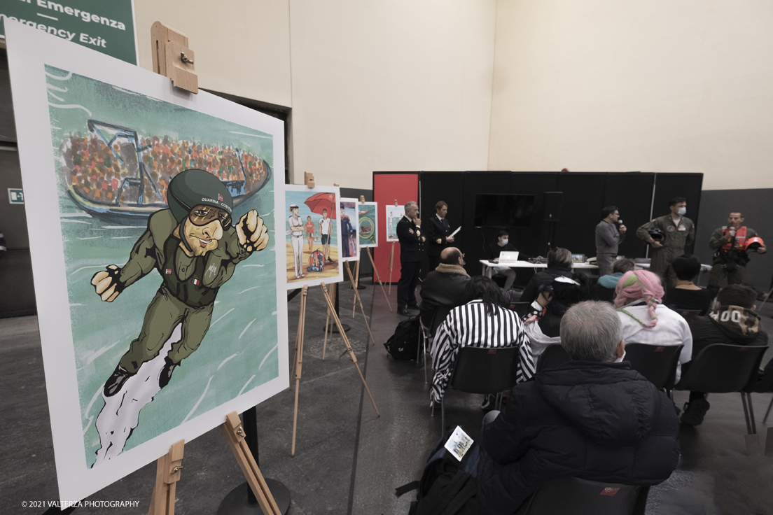 _DSF0092.jpg - 11/12/2021. Torino.  Fumetti, giochi, videogames e cosplay sono i protagonisti della settima edizione della kermesse irrinunciabile per tutti gli amanti di fumetti e tutto quello che ci gira intorno.. Nella foto  la presentazione del calendario  2022 nello stand della Guardia Costiera presente per fare comunicazione con i giovani