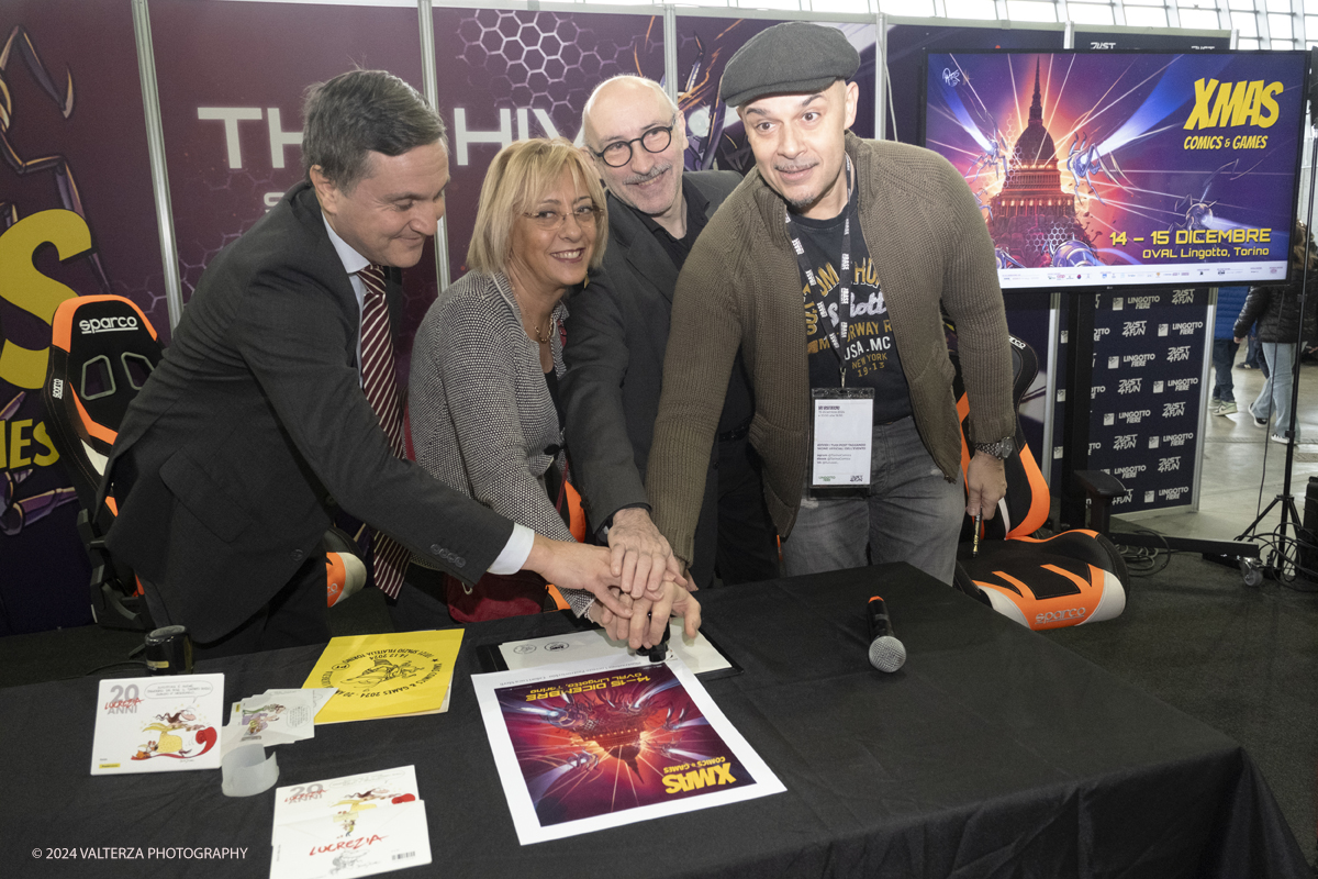 _DSF2268.jpg - Turin , Italy. 24th December,2024. The Opening of XMAS COMICS 2024, the philatelic cancellation dedicated to XMACS Comics and games , made by the representatives of Poste Italiane