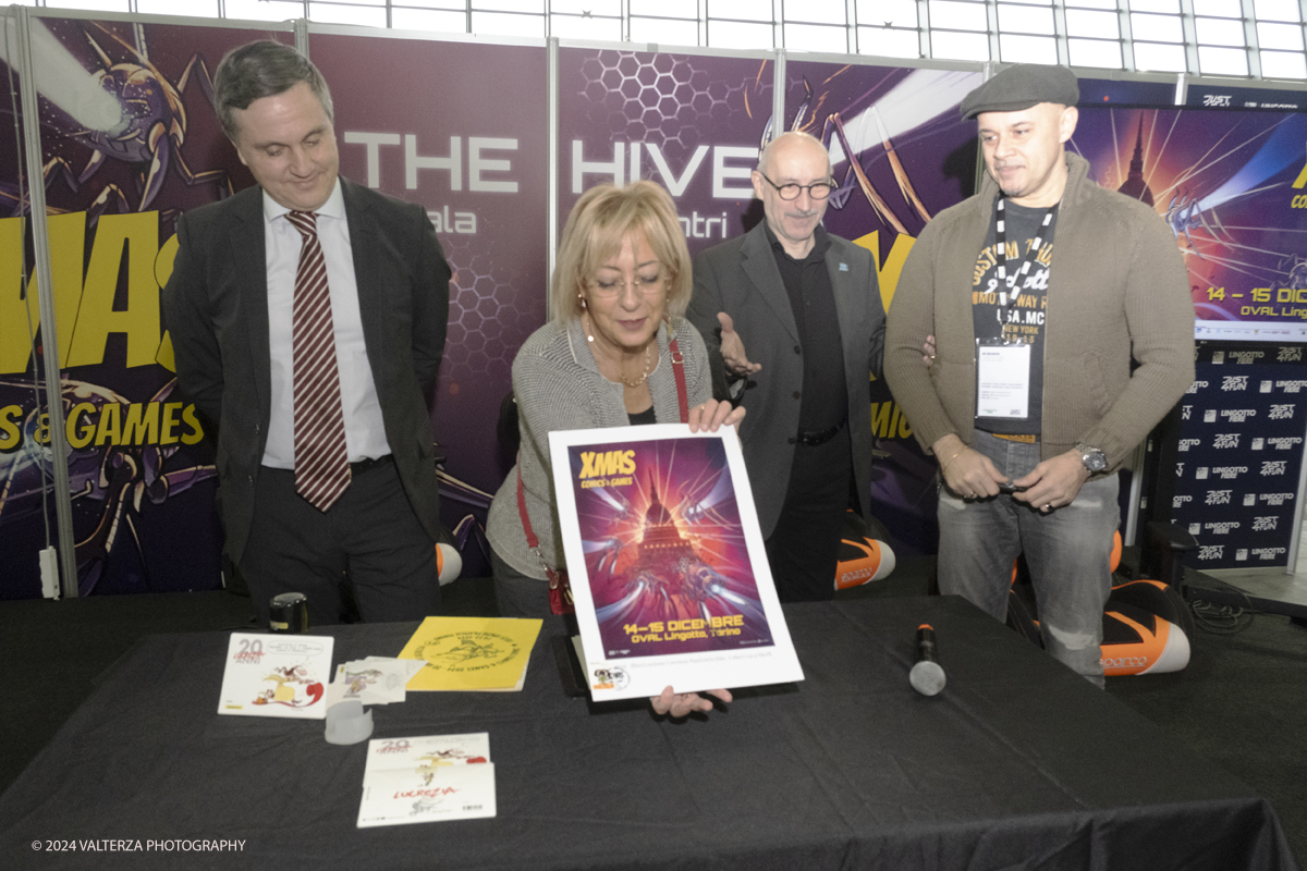 _DSF2275.jpg - Turin , Italy. 24th December,2024. The Opening of XMAS COMICS 2024, the philatelic cancellation dedicated to XMACS Comics and games , made by the representatives of Poste Italiane