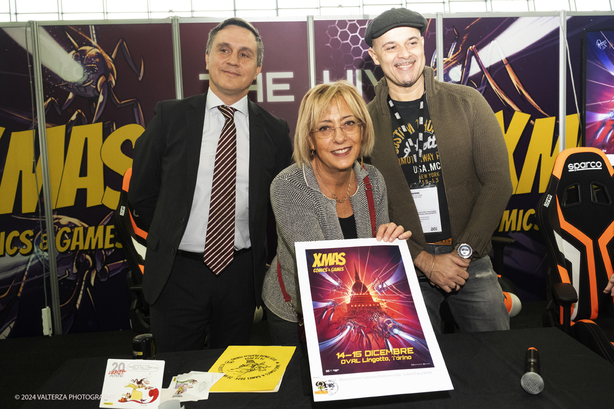 _DSF2284.jpg - Turin , Italy. 24th December,2024. The Opening of XMAS COMICS 2024, the philatelic cancellation dedicated to XMACS Comics and games , made by the representatives of Poste Italiane